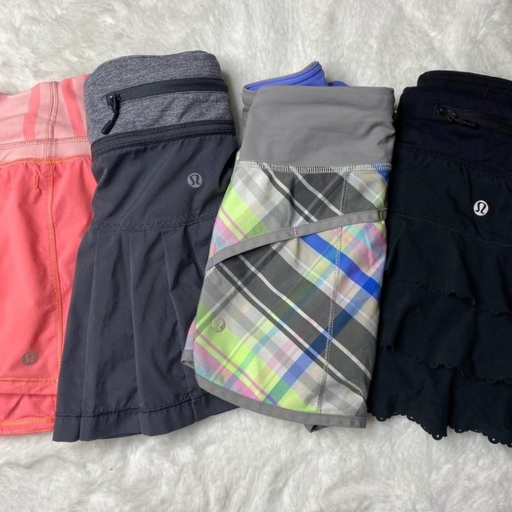 Lululemon lot of 4 Skirts Shorts Plaid Black Gray Scalloped Tiered Pink Size 4 6